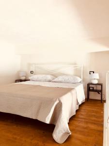 Ένα ή περισσότερα κρεβάτια σε δωμάτιο στο Asmara 10