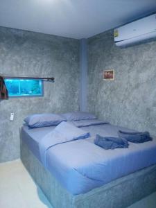 Postel nebo postele na pokoji v ubytování Chill loft โฮมเสตย์ + 25 fotografií