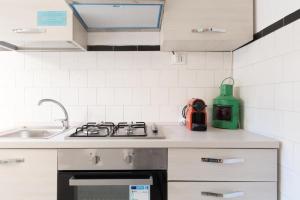 Kuchyň nebo kuchyňský kout v ubytování Appartamento Sestante