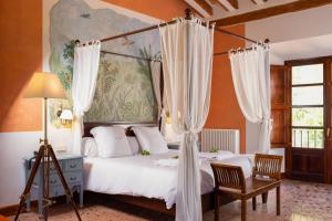 Ένα ή περισσότερα κρεβάτια σε δωμάτιο στο Hotel Finca Ca N'ai - Adults Only