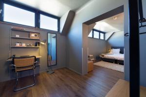 Cama o camas de una habitación en Hostellerie du Grünewald