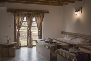 Llit o llits en una habitació de Resort Big House Plitvička jezera