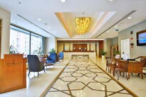 a lobby of a hospital with chairs and a waiting room at The Parma Hotel & Spa Taksim in Istanbul