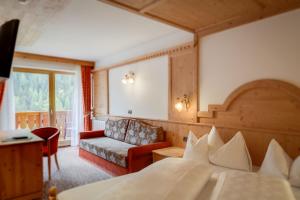 Postel nebo postele na pokoji v ubytování Hotel Muliac + 37 fotografií