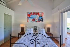 Ein Bett oder Betten in einem Zimmer der Unterkunft Dream Villa Anse Marcel 546