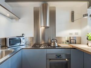 Kuchyňa alebo kuchynka v ubytovaní Loft in Trastevere