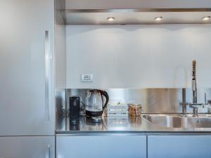 Kuchyňa alebo kuchynka v ubytovaní Loft in Trastevere