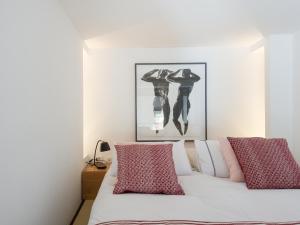Posteľ alebo postele v izbe v ubytovaní Loft in Trastevere