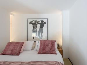 Posteľ alebo postele v izbe v ubytovaní Loft in Trastevere