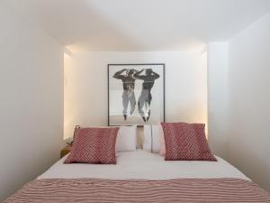 Posteľ alebo postele v izbe v ubytovaní Loft in Trastevere
