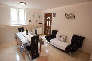 Posedenie v ubytovaní Apartmani Loreta
