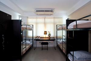 
A bunk bed or bunk beds in a room at G9bangkok
