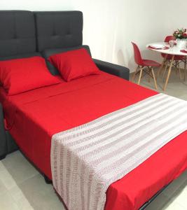 Postel nebo postele na pokoji v ubytování Corralejo Sun 202