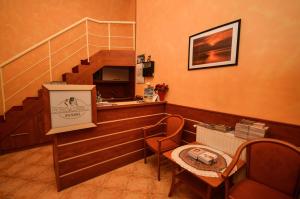Broadway City Guesthouse的休息区