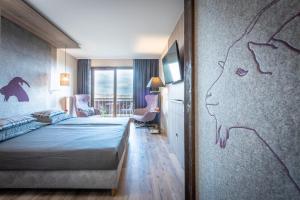 Postel nebo postele na pokoji v ubytování Berggasthof & Hotel Sennhütte