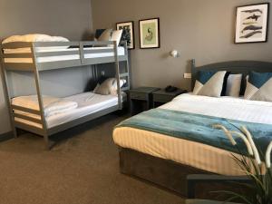 Una cama o camas en una habitación de Coast Rosslare Strand