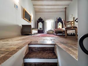 a living room with a pool in the middle of the floor at Gagliardi Boutique Hotel in Noto