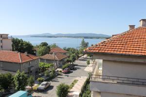 a view of a street in a town with houses at Fits Guest House in Primorsko