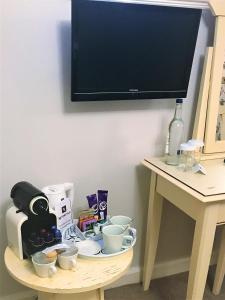 Coffee and tea-making facilities at Three Ways House Hotel; BW Signature Collection 