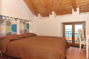 Postel nebo postele na pokoji v ubytování Casa Falcone B&B