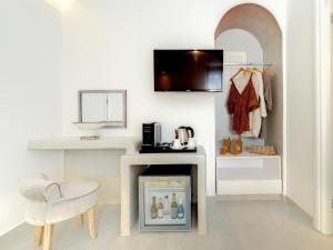 Telewizja i/lub zestaw kina domowego w obiekcie Emerald Collection Suites
