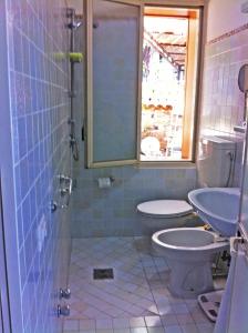 Ванная комната в Villa Calamona