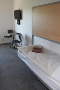 Postel nebo postele na pokoji v ubytování ICV SleepWell