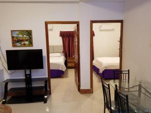 Postel nebo postele na pokoji v ubytování Enjoy Hotel