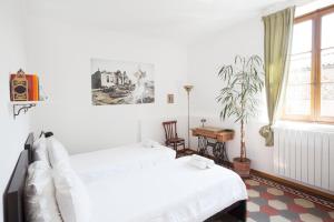 Postel nebo postele na pokoji v ubytování Buonocore Guesthouse