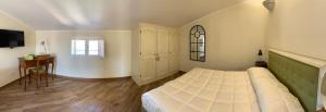 Postel nebo postele na pokoji v ubytování B&B ALVINO