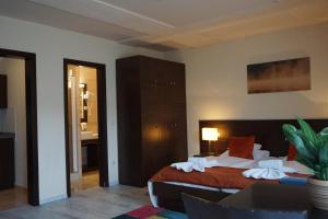 Postel nebo postele na pokoji v ubytování Villa Prestige
