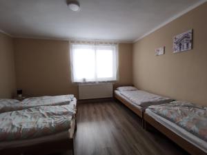 Postel nebo postele na pokoji v ubytování U Vrbů