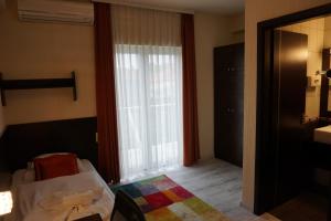 Postel nebo postele na pokoji v ubytování Villa Prestige