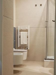 Kúpeľňa v ubytovaní MammaDada charm rooms + 37 fotografií