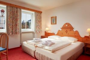 Postel nebo postele na pokoji v ubytování Mountain Home Zugspitze