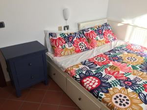 Postel nebo postele na pokoji v ubytování Villetta le Rose