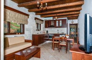 Kuchyň nebo kuchyňský kout v ubytování Ariadni Apartments