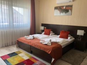 Postel nebo postele na pokoji v ubytování Villa Prestige