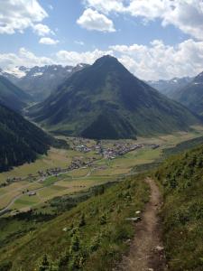 a view of a valley in a mountain range at Haus Elisabeth in Galtür