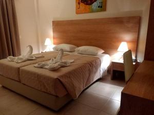 Posteľ alebo postele v izbe v ubytovaní International Hotel