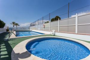 Bazén v ubytovaní Los Olivos Apartment Cullera alebo v jeho blízkosti