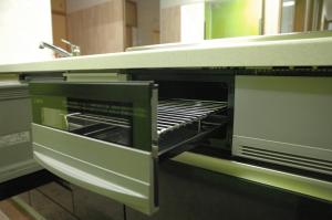 a microwave oven sitting on top of a counter at Kamikatsura House in Kyoto