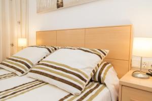 Posteľ alebo postele v izbe v ubytovaní Los Olivos Apartment Cullera