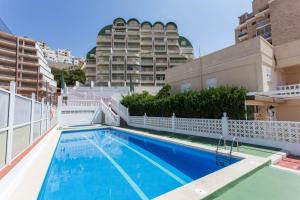 Bazén v ubytovaní Los Olivos Apartment Cullera alebo v jeho blízkosti