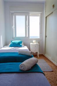 Postel nebo postele na pokoji v ubytování Blue View
