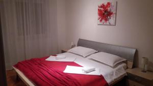 Postel nebo postele na pokoji v ubytování Apartman Teklić