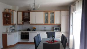 Kuchyň nebo kuchyňský kout v ubytování Apartman Teklić