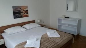 Postel nebo postele na pokoji v ubytování Apartman Teklić