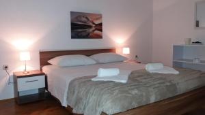 Postel nebo postele na pokoji v ubytování Apartman Teklić