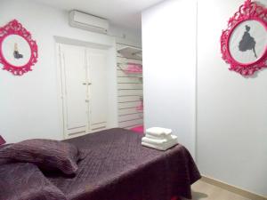 Postel nebo postele na pokoji v ubytování Apartamentos Capuchinas